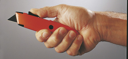 COUTEAU AUTO-RETRACTABLE BIMAT. CORPS ZAMAC LAMES TRAPEZOID.